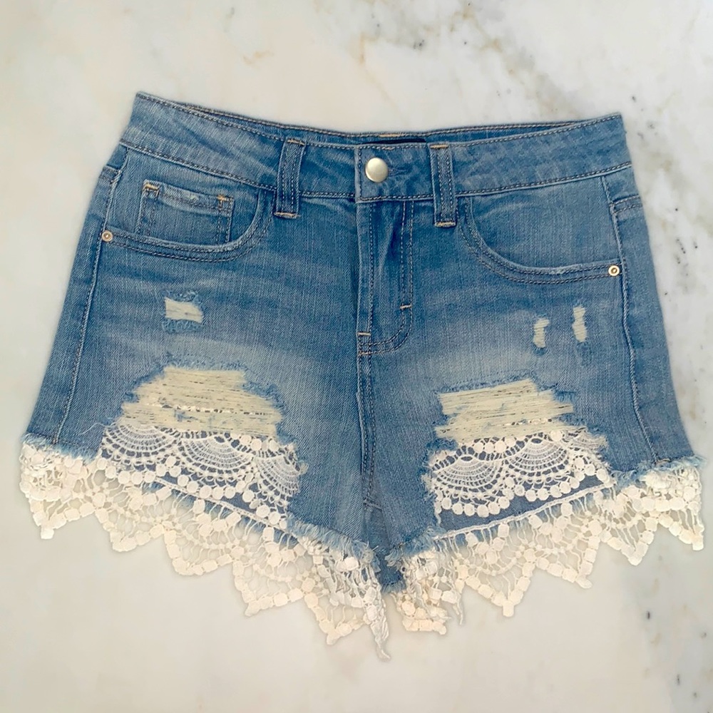 New, Forever 21 size 26 distressed denim shorts with crochet detailing